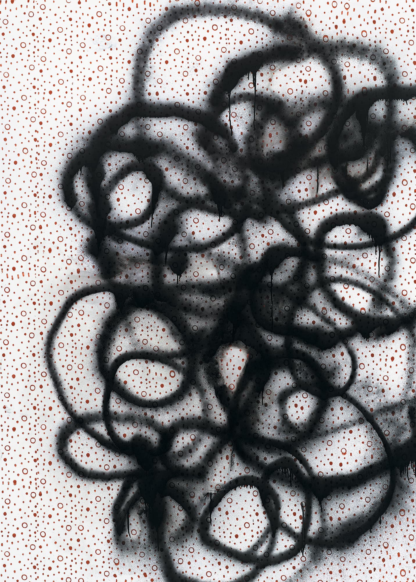 A color image of a painting of curlicue arabesques of black spray paint over an underpainting of a pattern of dots and circles in red.